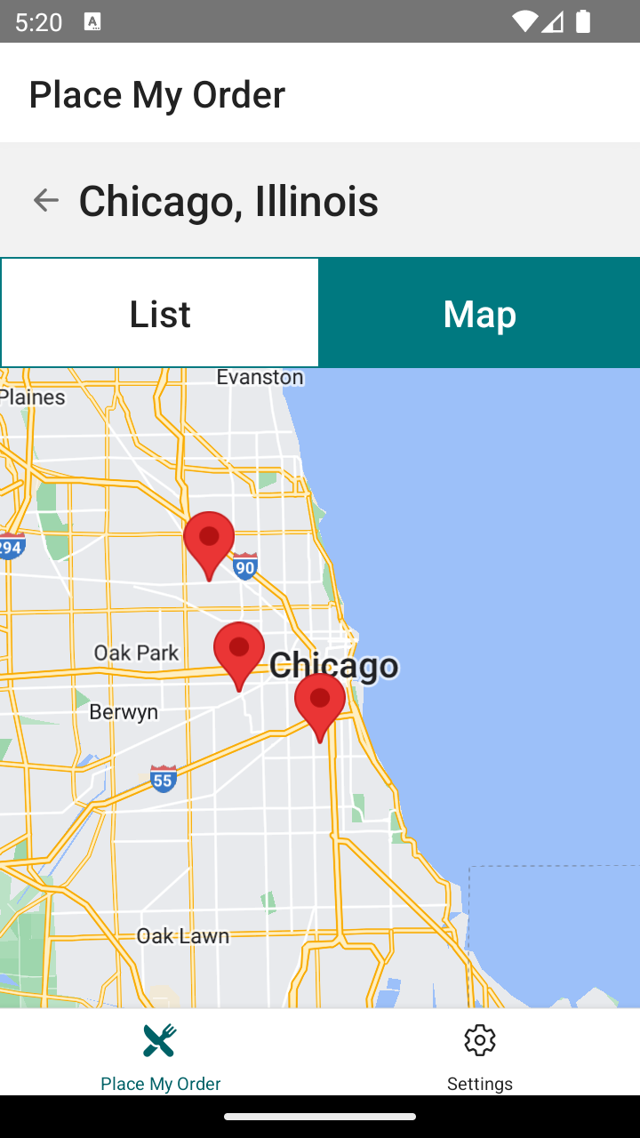 Screenshot of the restaurant view with the title “Green Bay, Wisconsin.” The map is still centered on Green Bay and now has several locations marked with red pins. One of the markers is labeled Cheese Curd City, 230 W Kinzie Street. The bottom tab bar has icons for Place My Order and Settings.